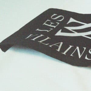 Les Vilains Original Streetwear white sweater black armband close up